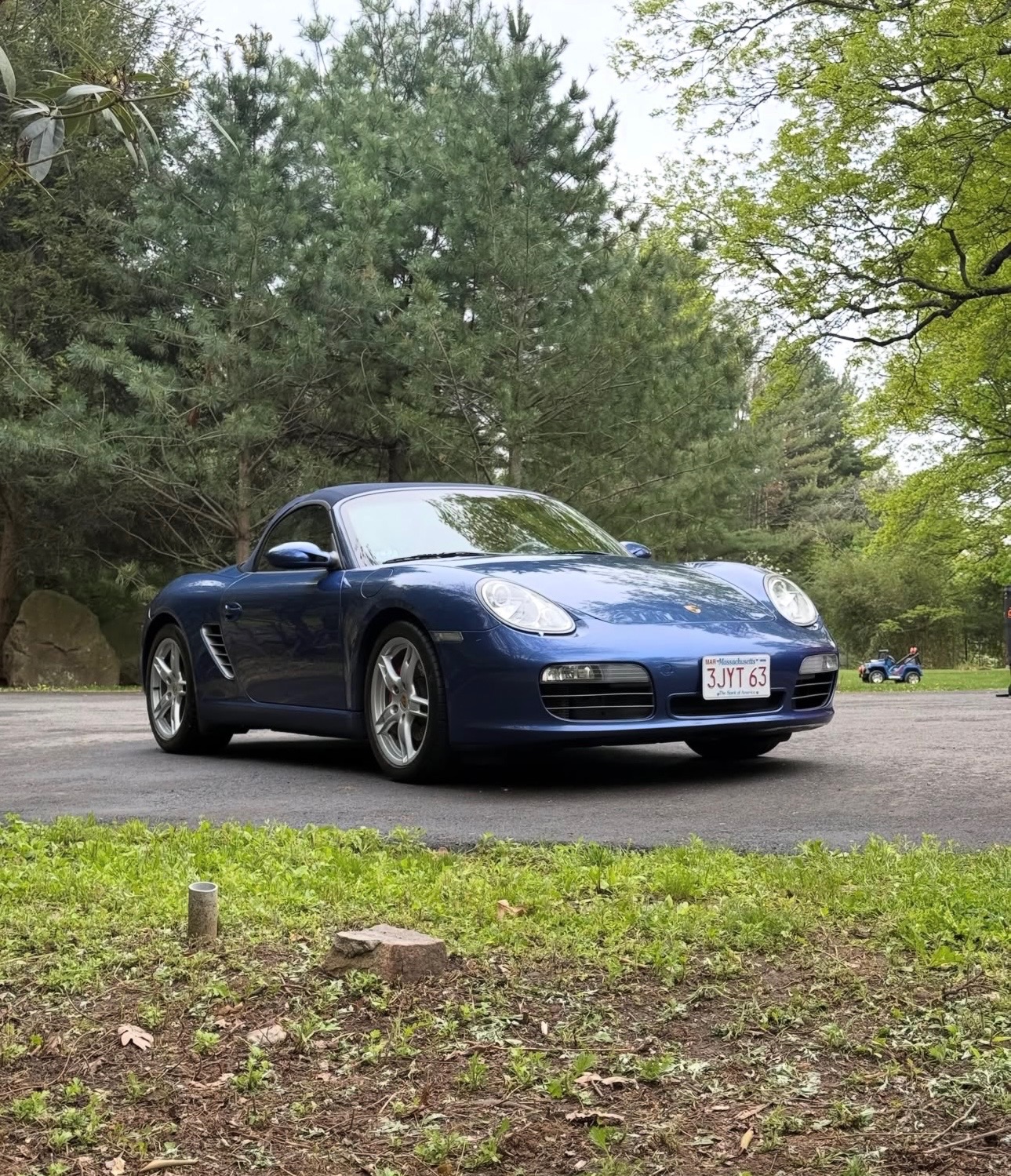 Detailed blue Porsche Boxster exterior